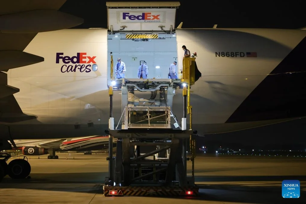 Loading Onto the FedEx Charter Aircraft